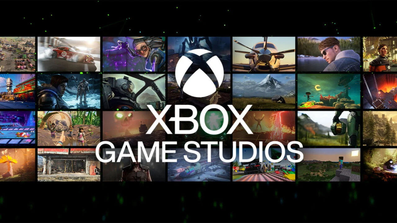 Ілюстрація, що передає атмосферу скорочень у Xbox. На передньому плані — офісна будівля з логотипом Xbox, освітлена холодними тонами. Усередині видно порожні робочі місця та вимкнені монітори, що символізують закриття студії. У фоні — тіньові силуети співробітників, які залишають приміщення. Загальна атмосфера стримана й напружена, з акцентом на корпоративну кризу та невизначене майбутнє.