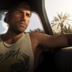 Джейсон із GTA 6 сидить в автомобілі на тлі пальм у Вайс-Сіті — кадр із розширеного трейлера гри