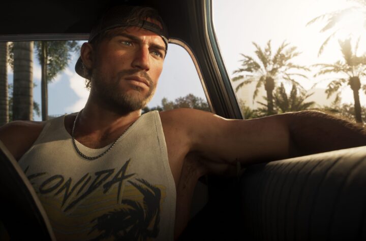 Джейсон із GTA 6 сидить в автомобілі на тлі пальм у Вайс-Сіті — кадр із розширеного трейлера гри
