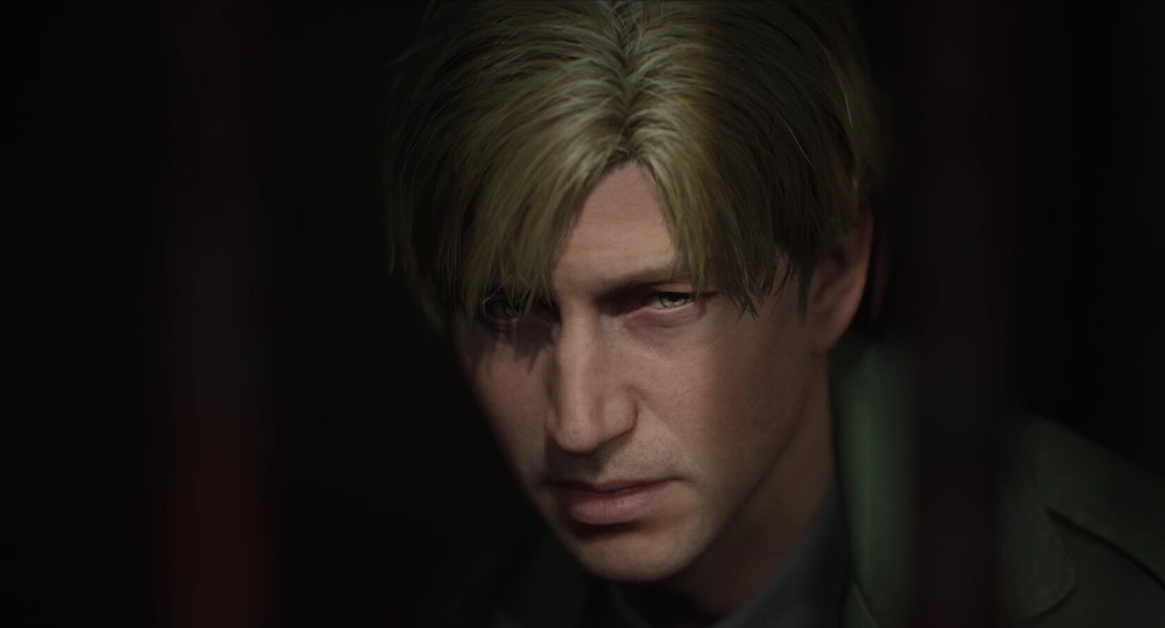 Silent Hill 2 покине PlayStation Plus у жовтні Крупний план персонажа в темній сцені з Silent Hill 2